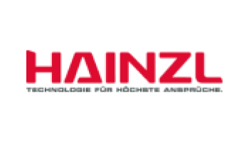 Logo mit der Aufschrift „Hainzl“ in fetten roten Buchstaben und dem Text „Verlässlichkeit durch lösungsorientierte Arbeit“ in kleinerer schwarzer Schrift darunter. Der Hintergrund ist weiß.
