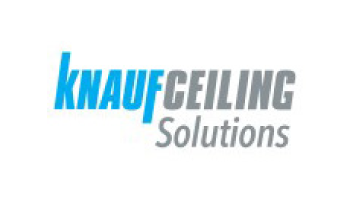 Logo von Knauf Ceiling Solutions mit dem Firmennamen in stilisierter Schriftart. „Knauf“ ist blau geschrieben, „Ceiling“ ist grau und „Solutions“ steht darunter in kleineren grauen Buchstaben. Der Hintergrund ist weiß.