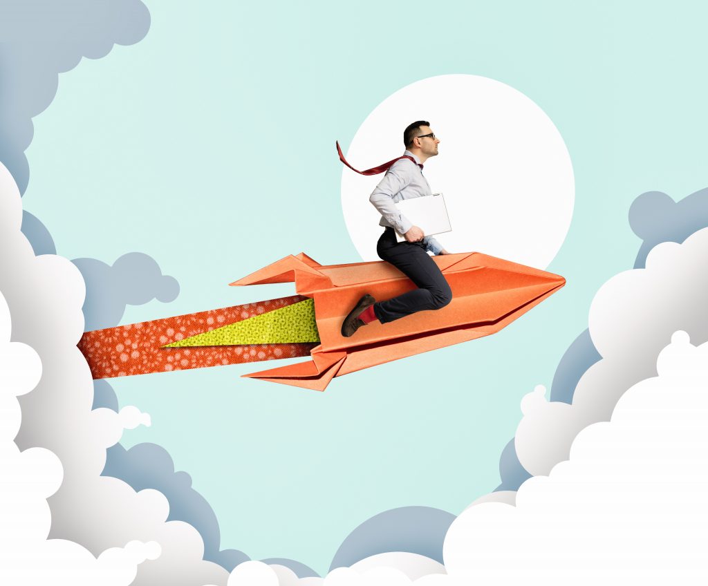 Ein Mann auf einer Rakete.